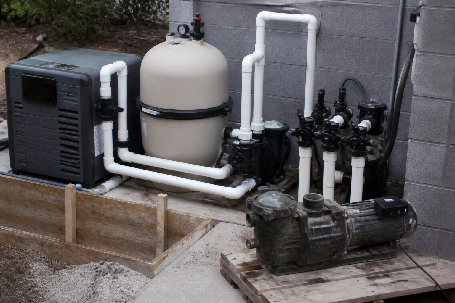 New pool equipment being placed during a renovation